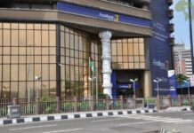 Loan Losses, Revenue Slump Drag First Holdco Profit Down 15.5%